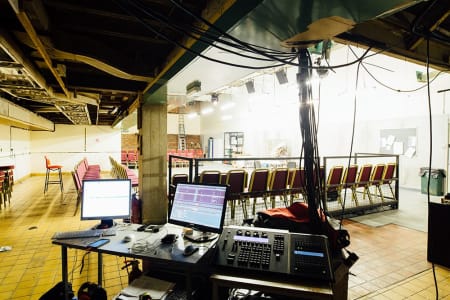 A performance space in Theatre Deli on The Moor set up for a show with a technical desk at the back