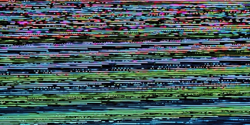 An image of multiple lines of various colours as a broken screen